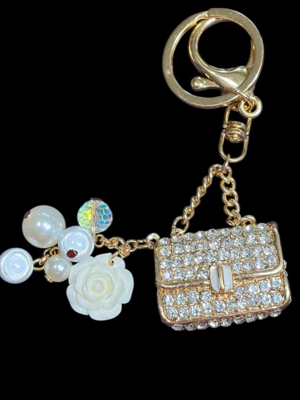 BAG CHARM GOLDTONE WITH RHINESTONE PURSE AND FLOWER AND PEARL ACCENTS